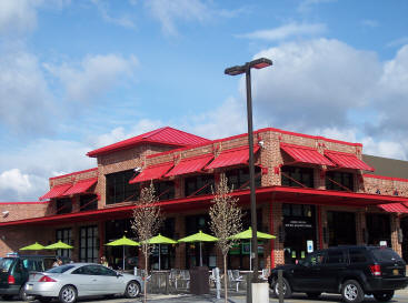 This vivid red shows off the SnapLok metal roofing system from IMETCO, which provides a recognizable brand image to this convenience store chain.